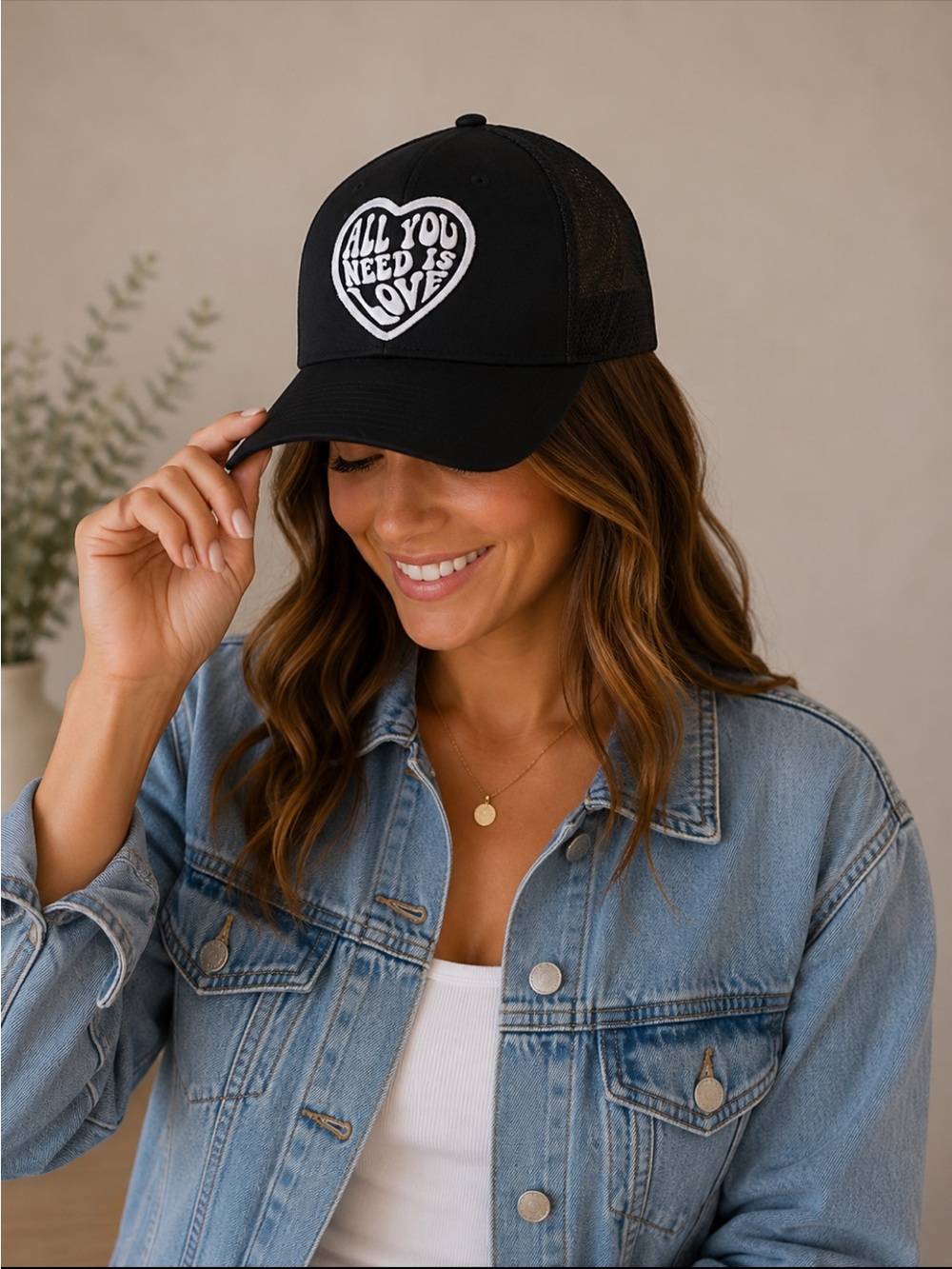 The Classic Black Trucker Hat with White Heart Patch